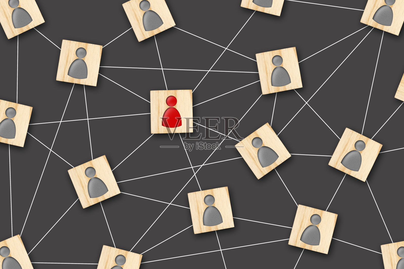 社交网络的概念。带有灰色和红色人形图标的木块相互连接。领导。团队合作。在互联网聊天。照片摄影图片