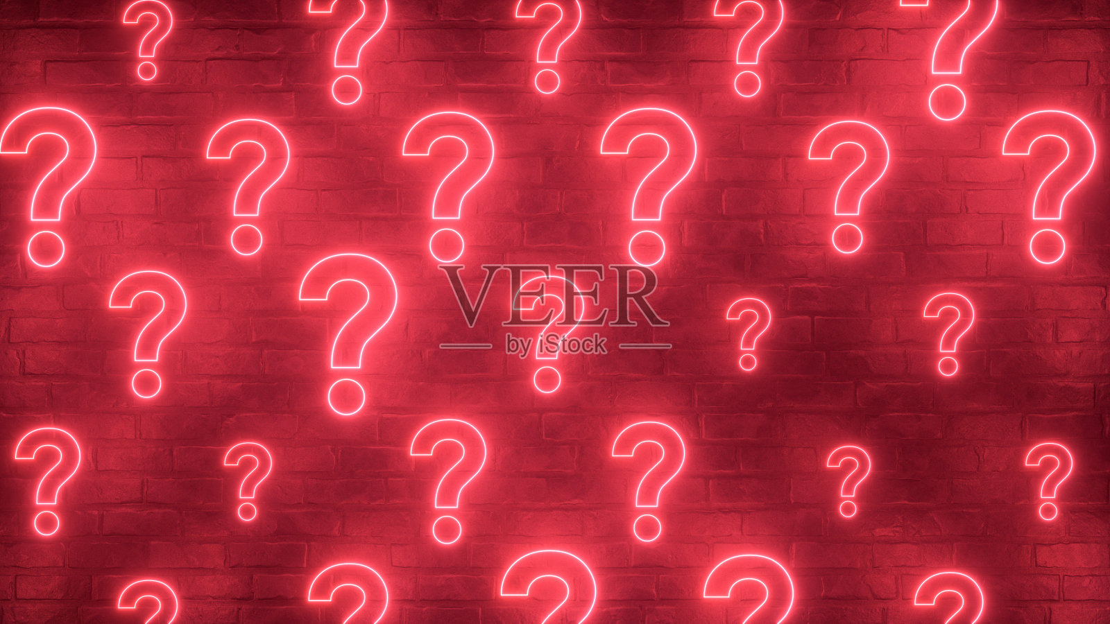 砖墙上的问号霓虹灯照片摄影图片