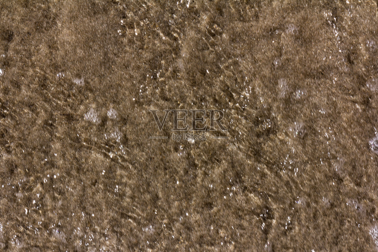 湿沙子作为纹理。沙子的背景。照片摄影图片