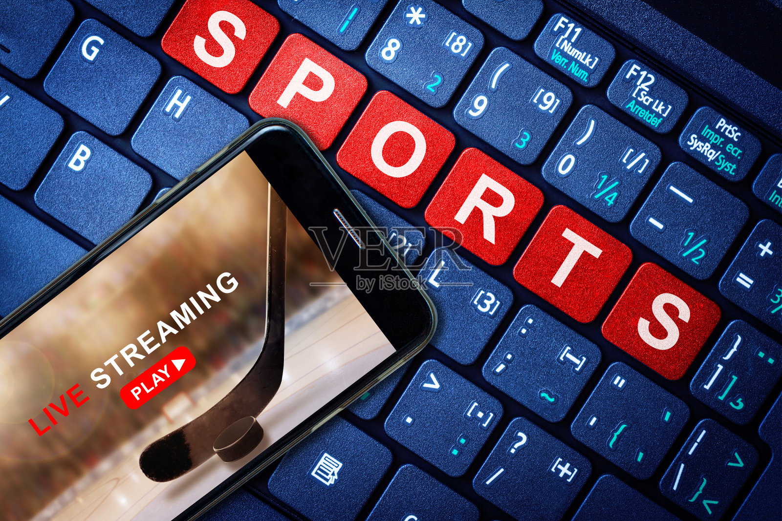 体育直播展示手机冰球游戏照片摄影图片