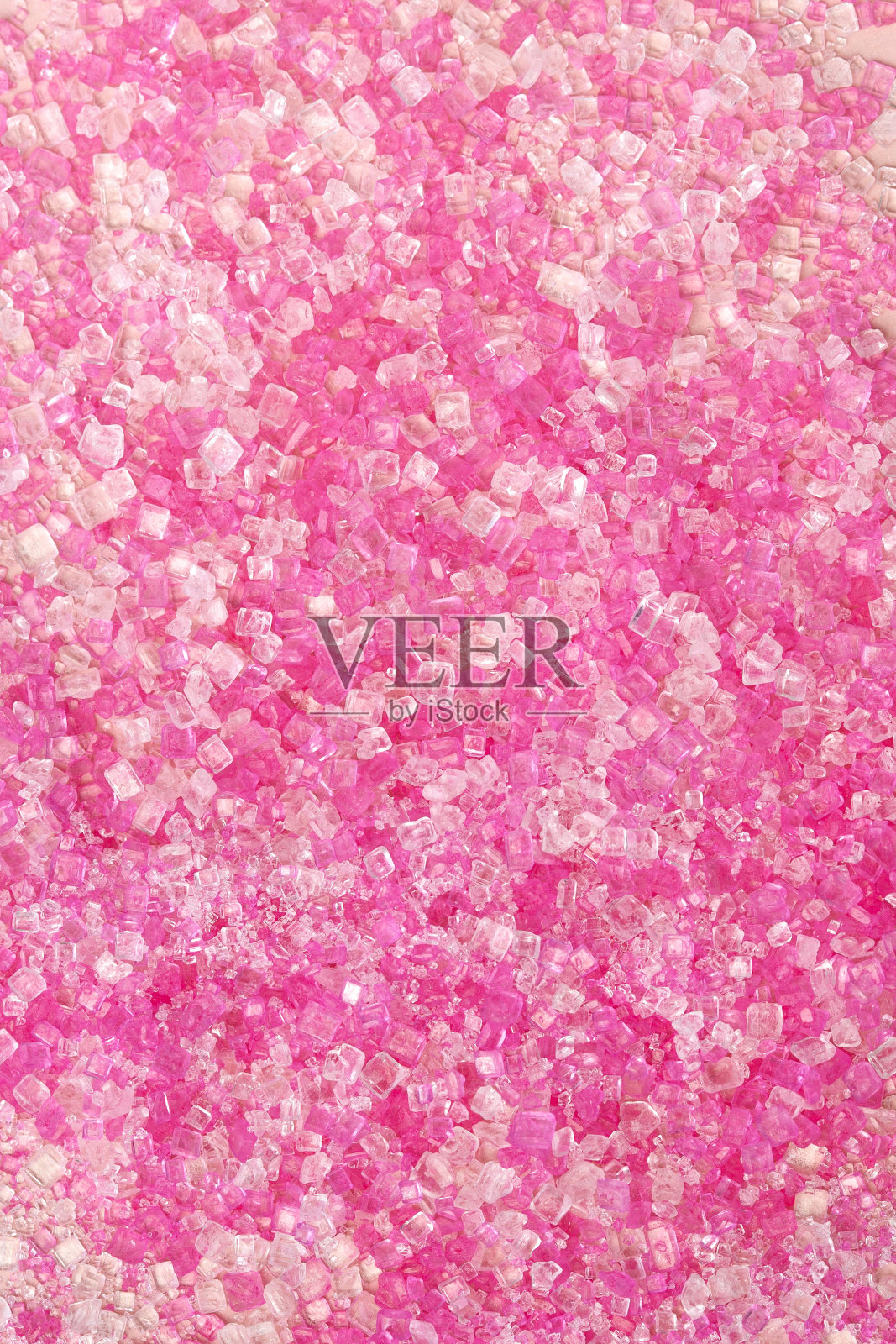 粉红色的糖背景-白色和粉红色晶体无缝质地。照片摄影图片