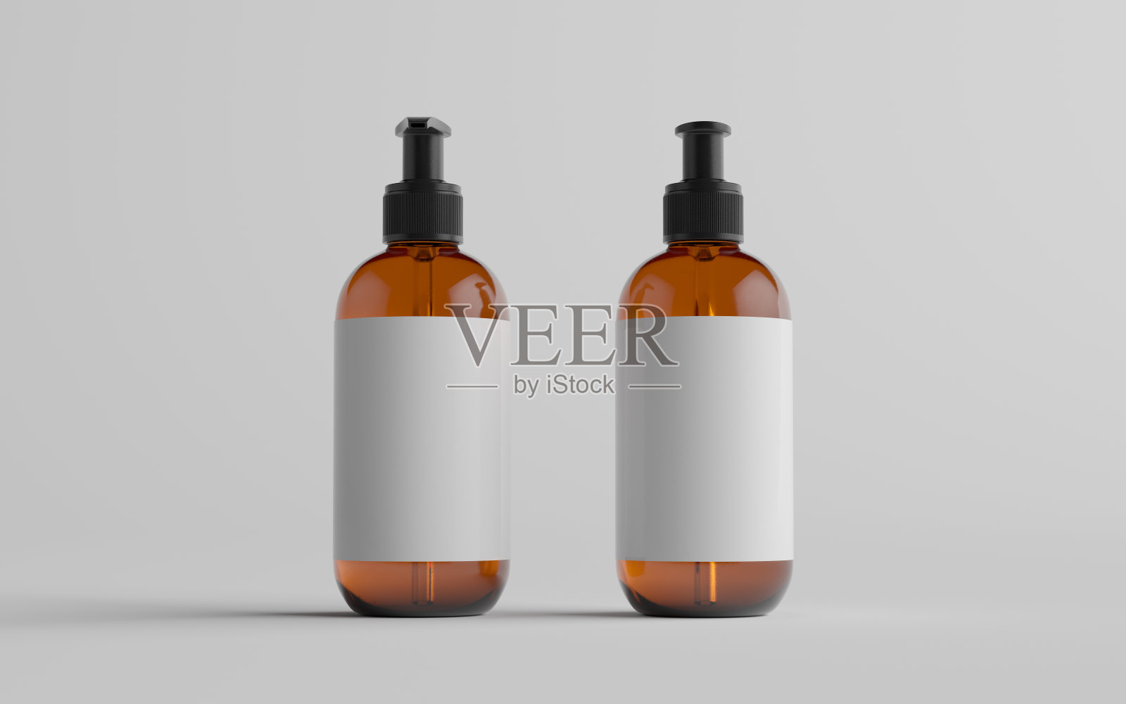 琥珀玻璃泵瓶模型-液体肥皂，洗发水分配器-前面和后面。空白的标签照片摄影图片