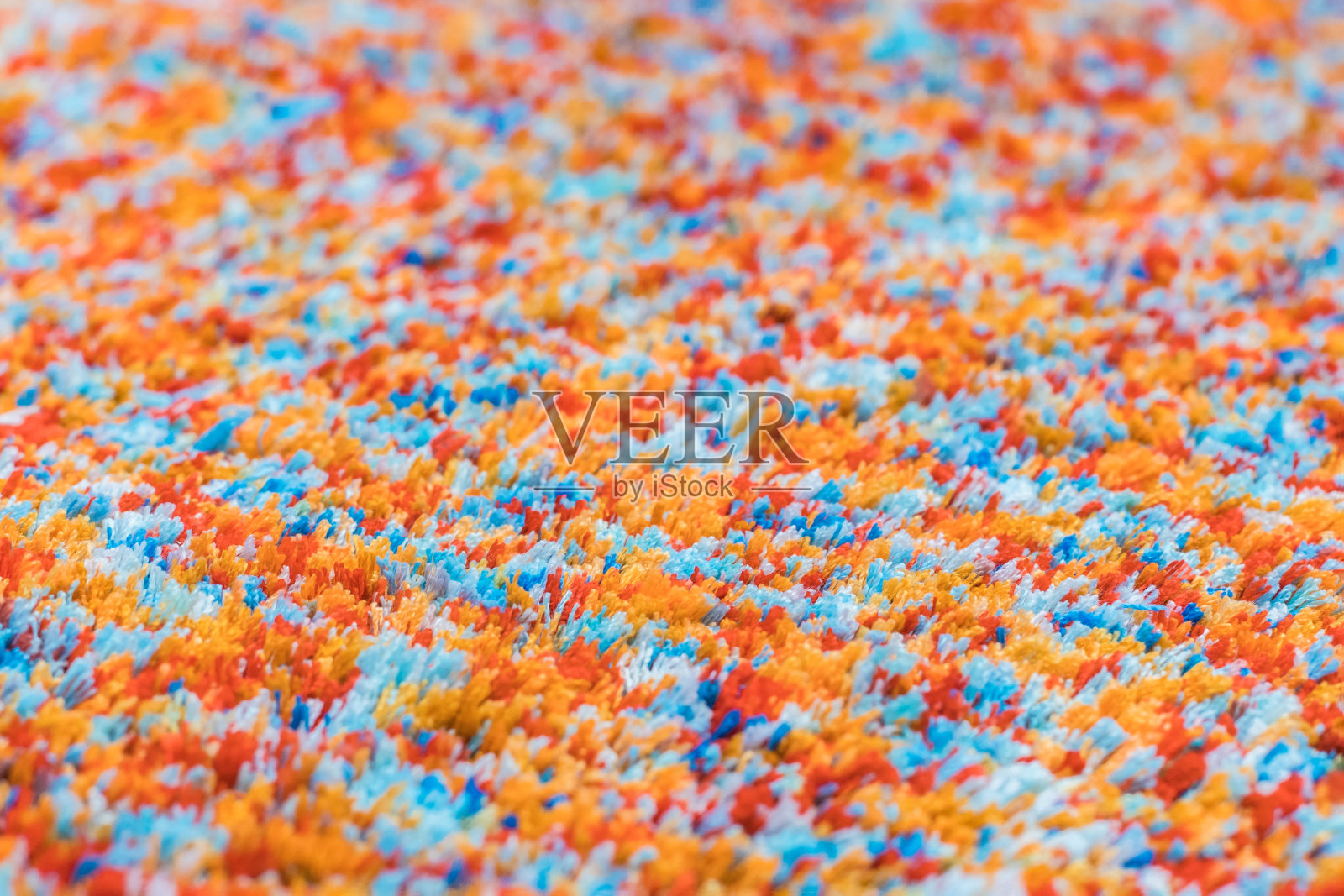 抽象纹理的长堆积地毯。照片摄影图片