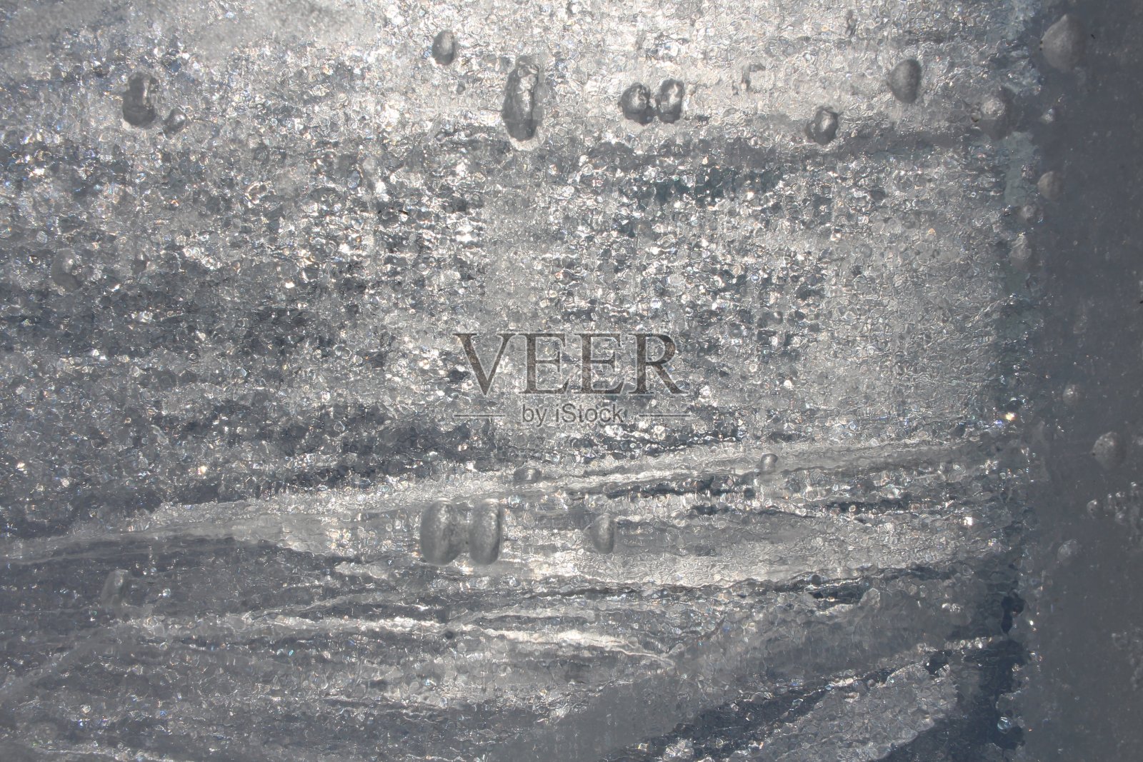 冻结的气泡在透明冰的背景厚度照片摄影图片