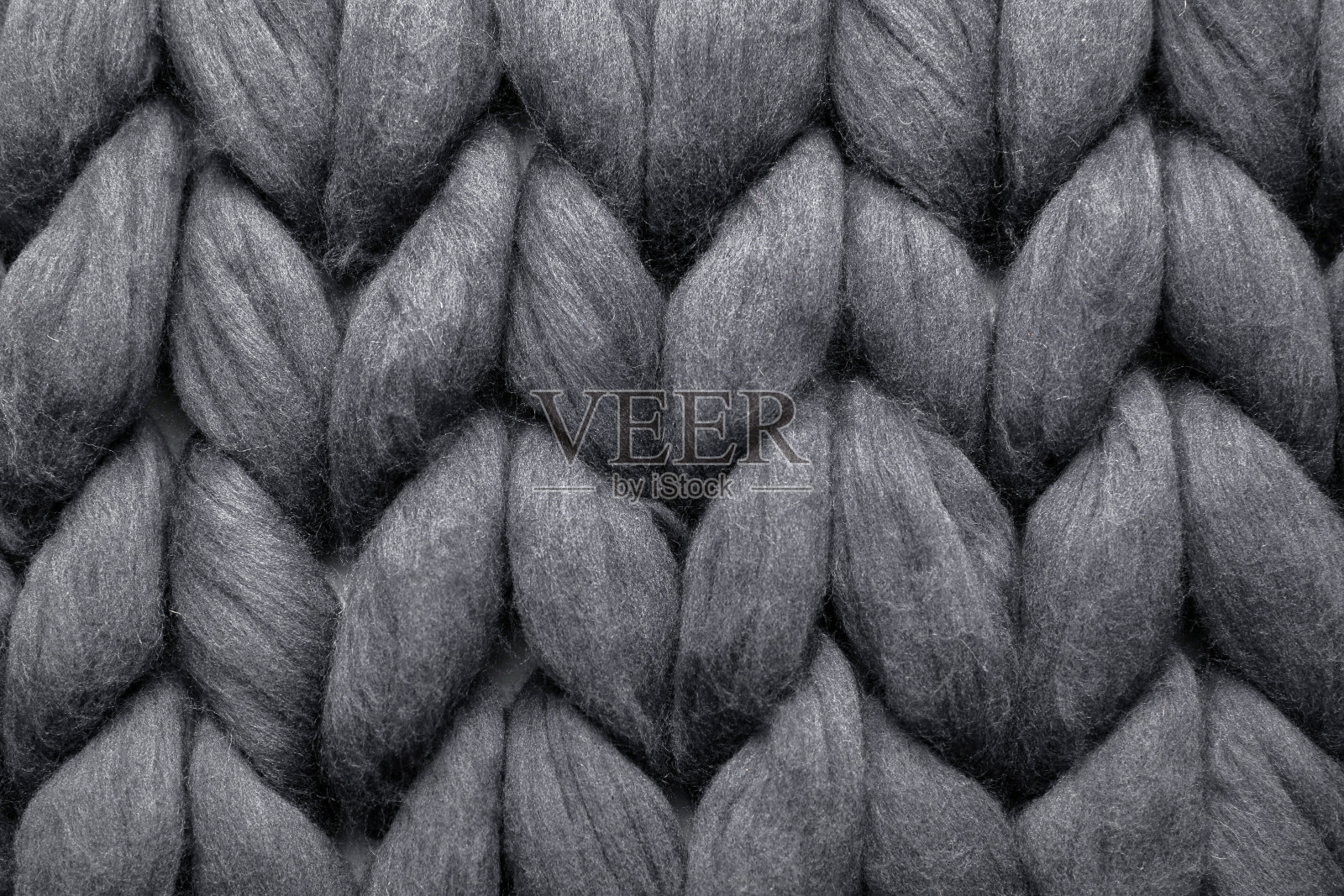 黑色针织羊毛纹理为背景，俯视图照片摄影图片