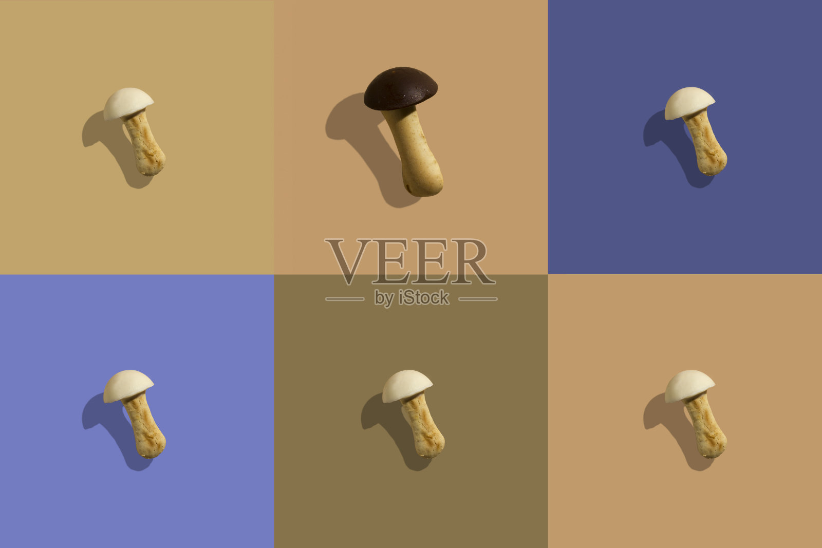 多色几何背景蘑菇饼干。彩色纸纹理。极简主义的背景照片摄影图片