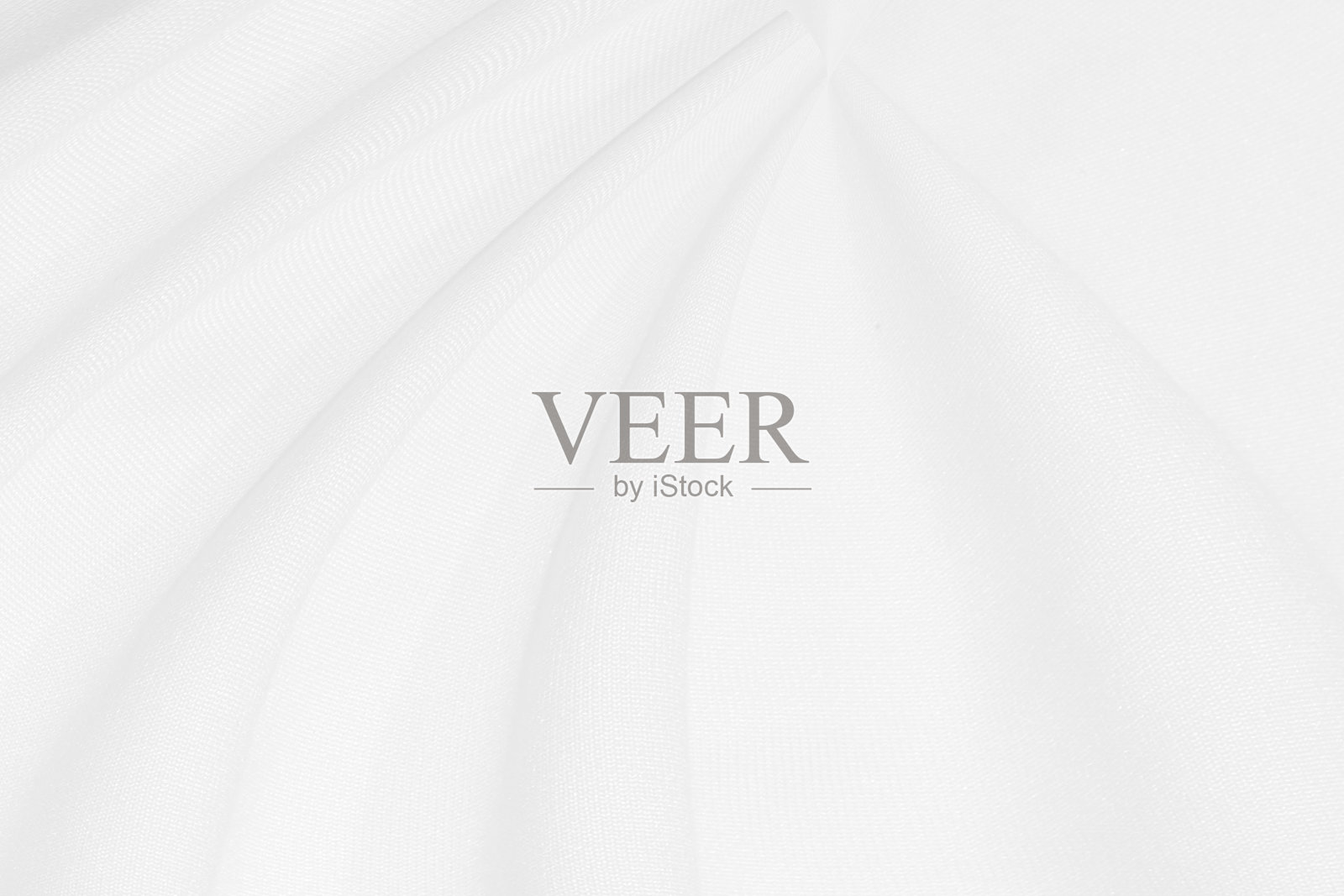 柔和的光影织物抽象流畅的曲线造型装饰现代时尚白色和灰色背景照片摄影图片