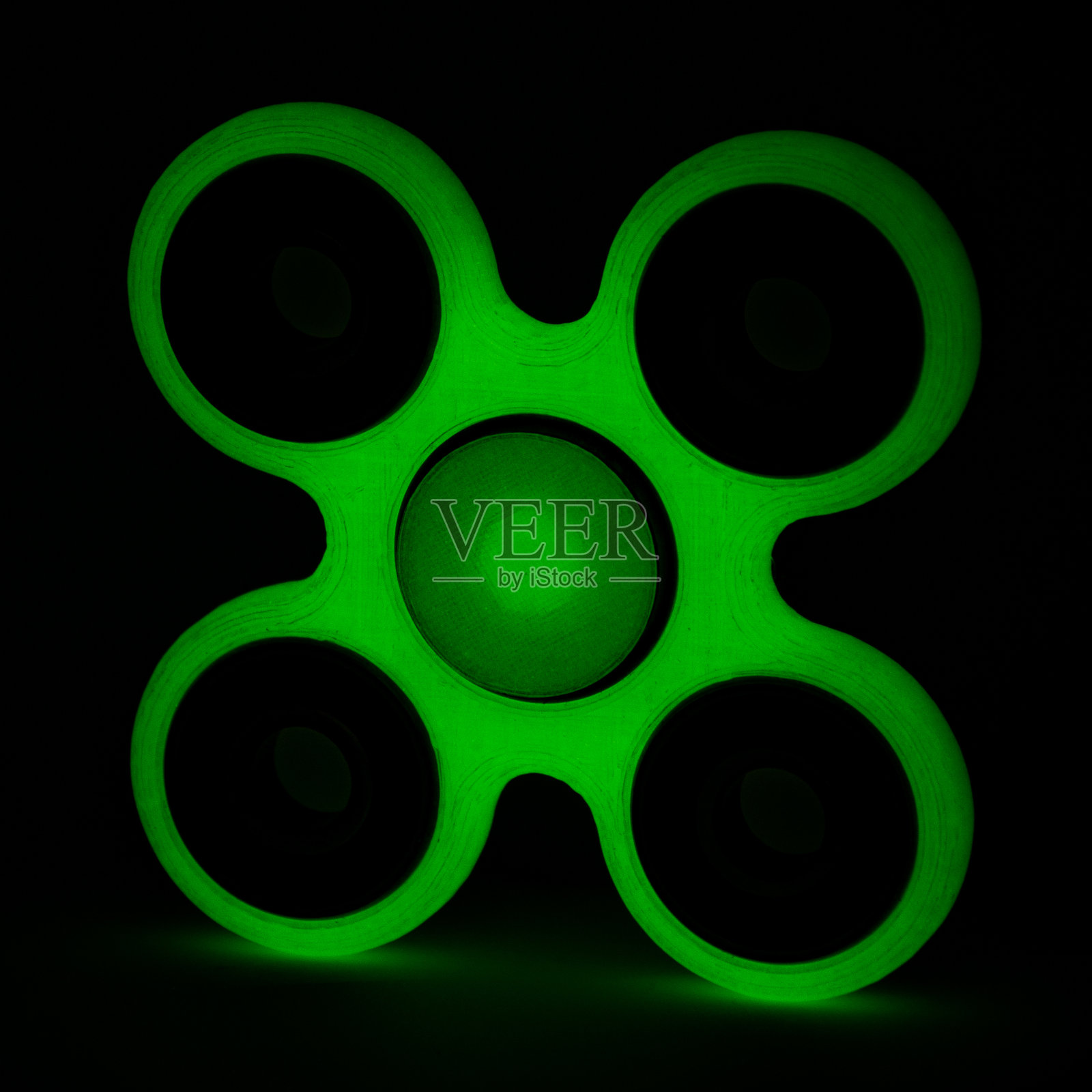 发光的指尖陀螺可以放松，缓解压力，玩耍照片摄影图片