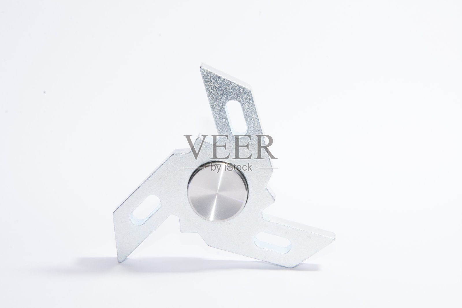 指尖陀螺用来放松，缓解压力，玩耍照片摄影图片