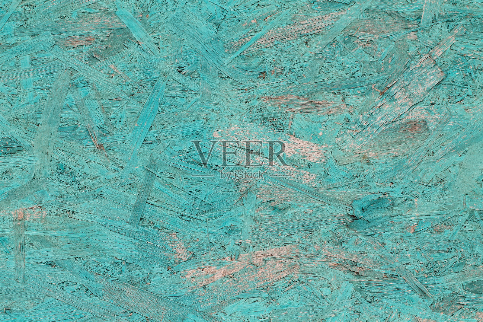 用蓝色油漆涂的旧木头表面。照片摄影图片