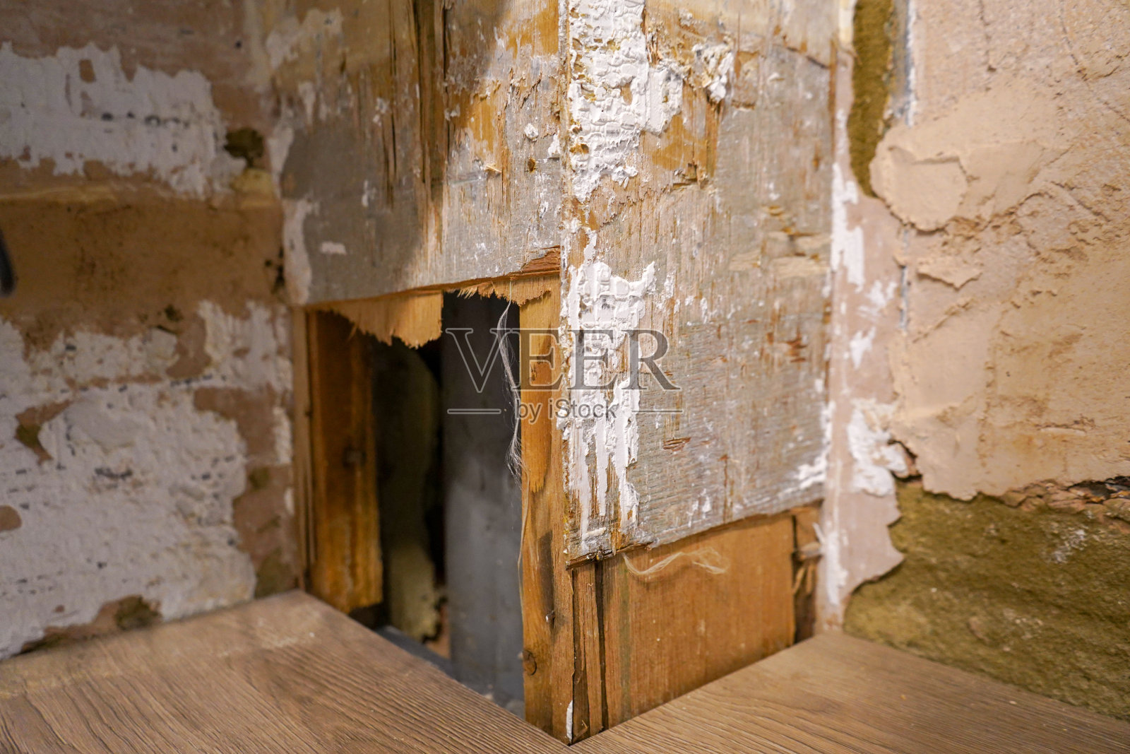 关闭损坏的灰泥墙照片摄影图片