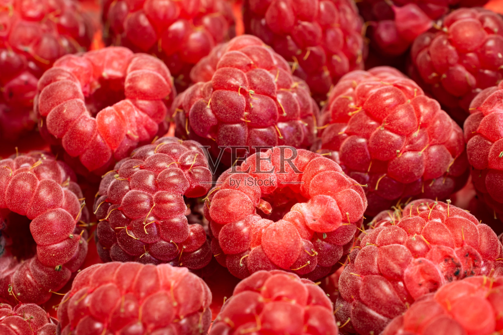 带有可见细节的红色覆盆子。背景或纹理照片摄影图片