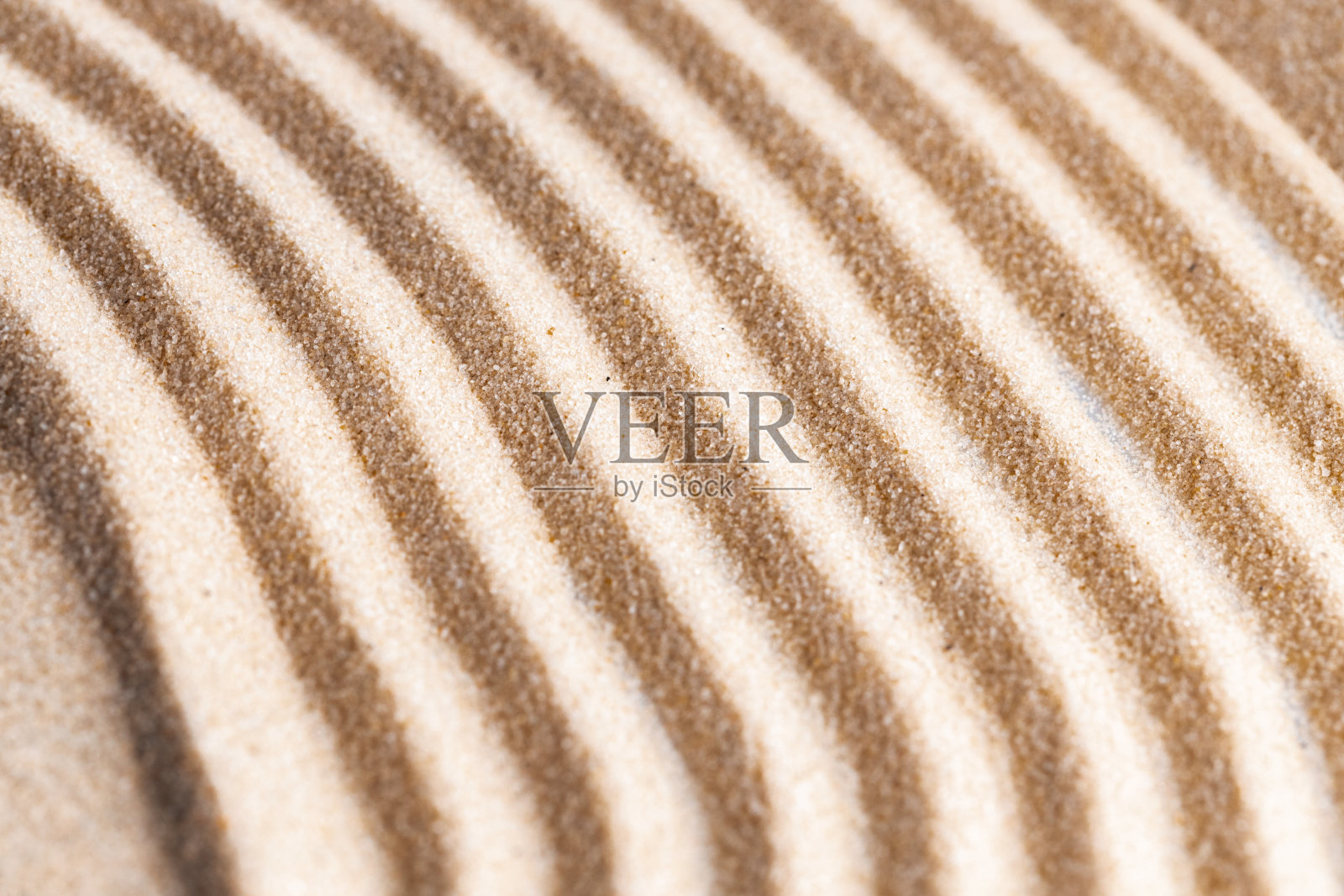 黄沙禅宗图案，特写。照片摄影图片