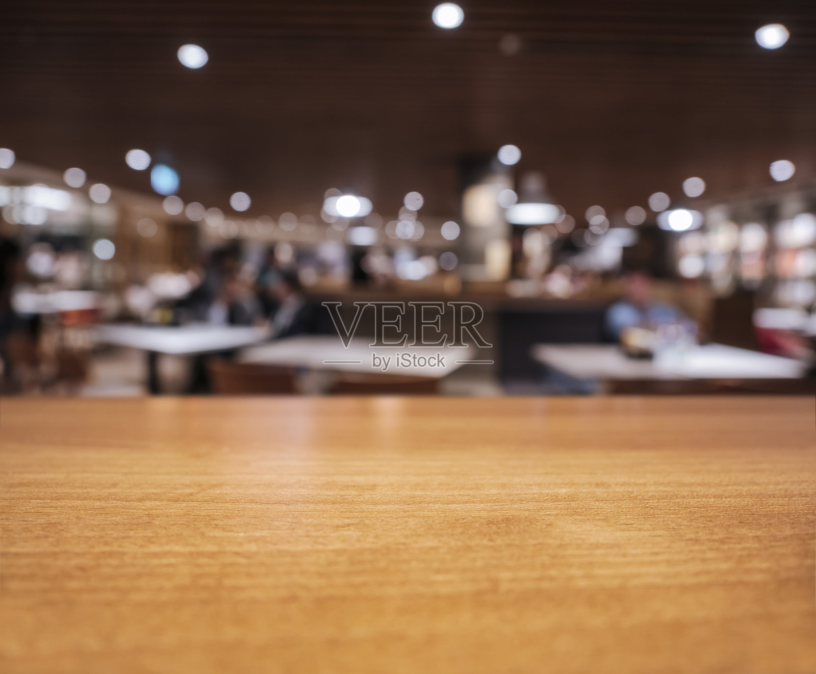 桌面人们坐在餐厅商店内部模糊背景照片摄影图片