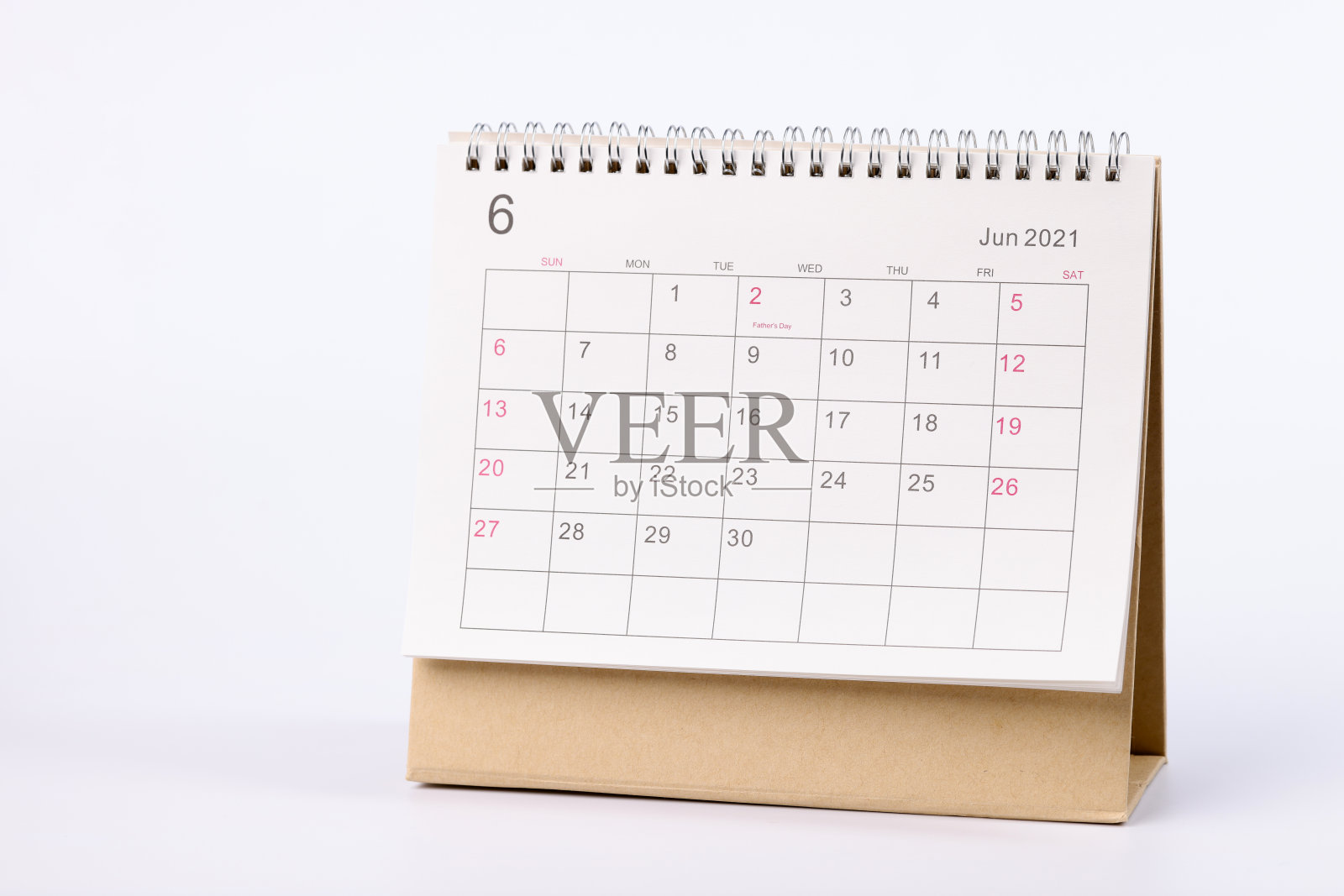 白色背景的纸质挂历照片摄影图片