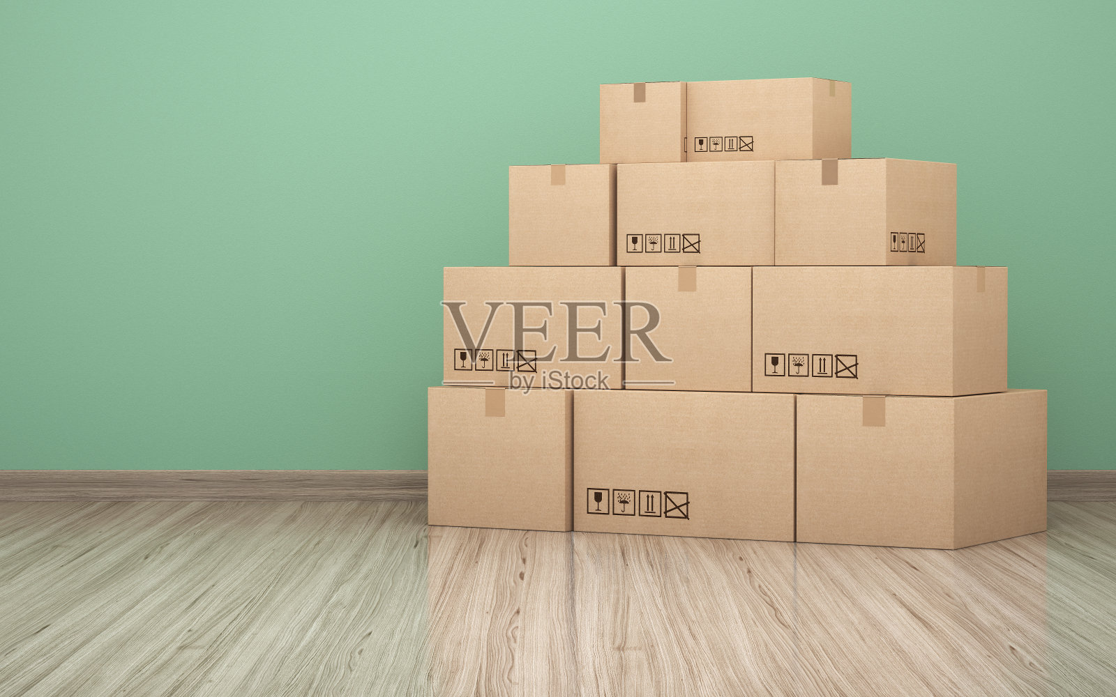 纸板箱前的绿墙库存照片照片摄影图片