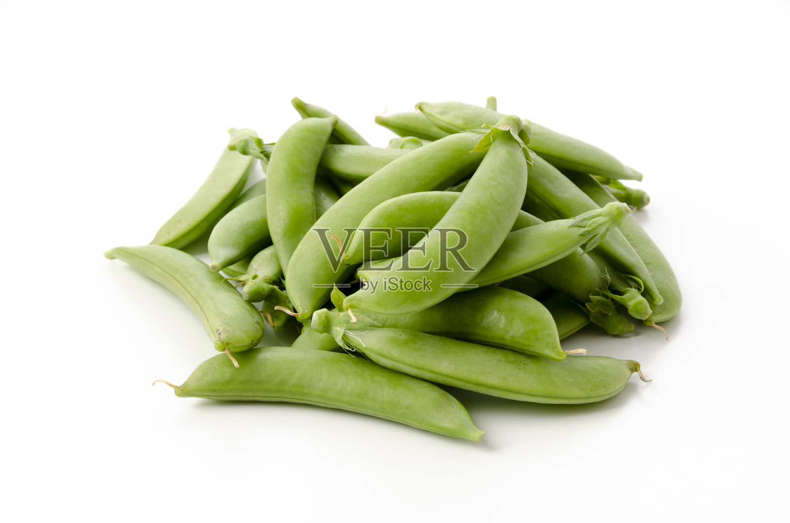 白底上的糖豌豆。照片摄影图片