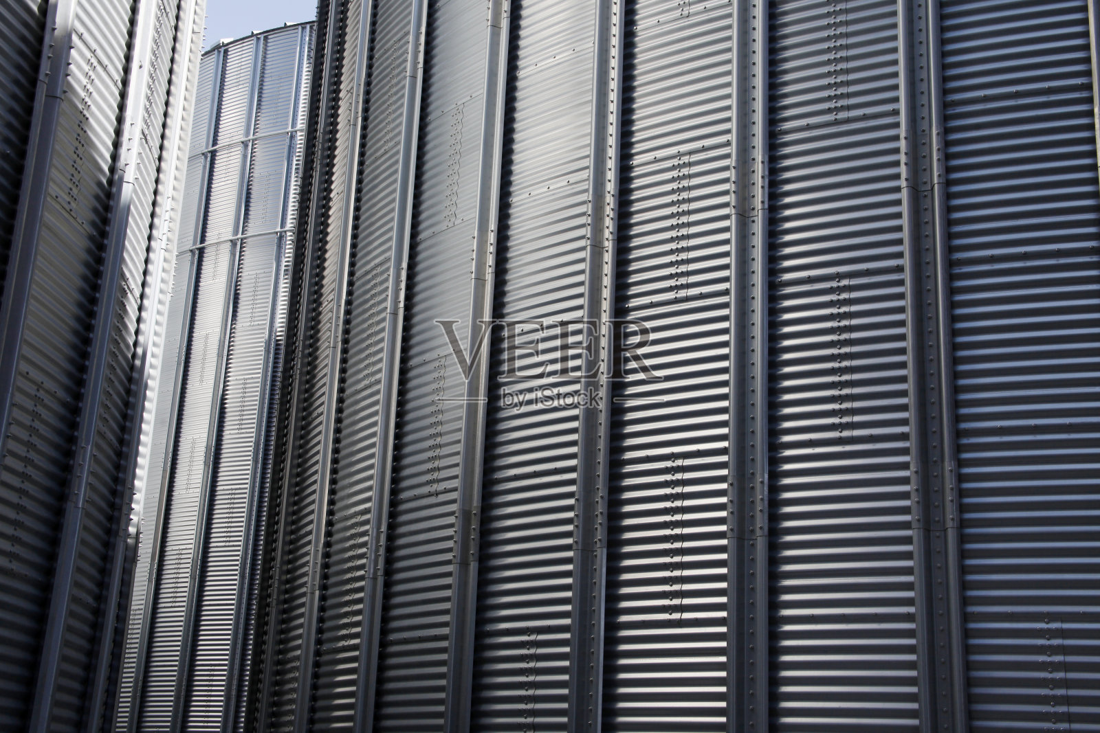 不锈钢粮仓。农业。照片摄影图片