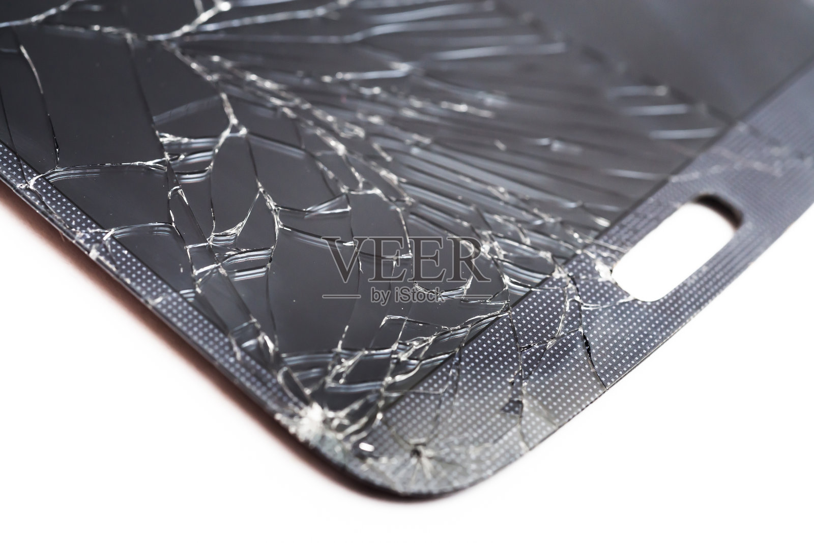 手机智能手机破碎玻璃液晶触摸屏上的白色背景。照片摄影图片