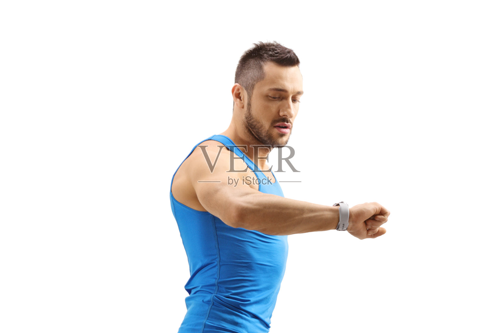 运动员在看他的智能手表照片摄影图片