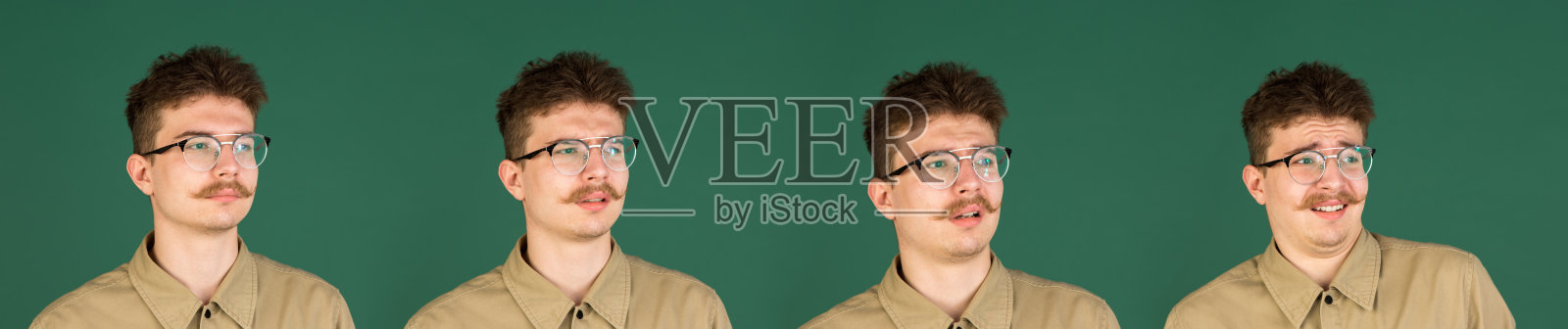 情感的进化。白人男子的肖像孤立在绿色的工作室背景与拷贝空间照片摄影图片