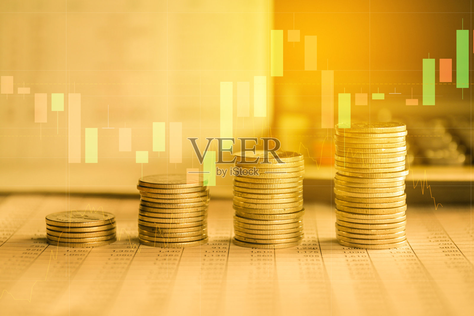 钱币堆叠与外汇交易图形，金融投资概念使用为背景照片摄影图片