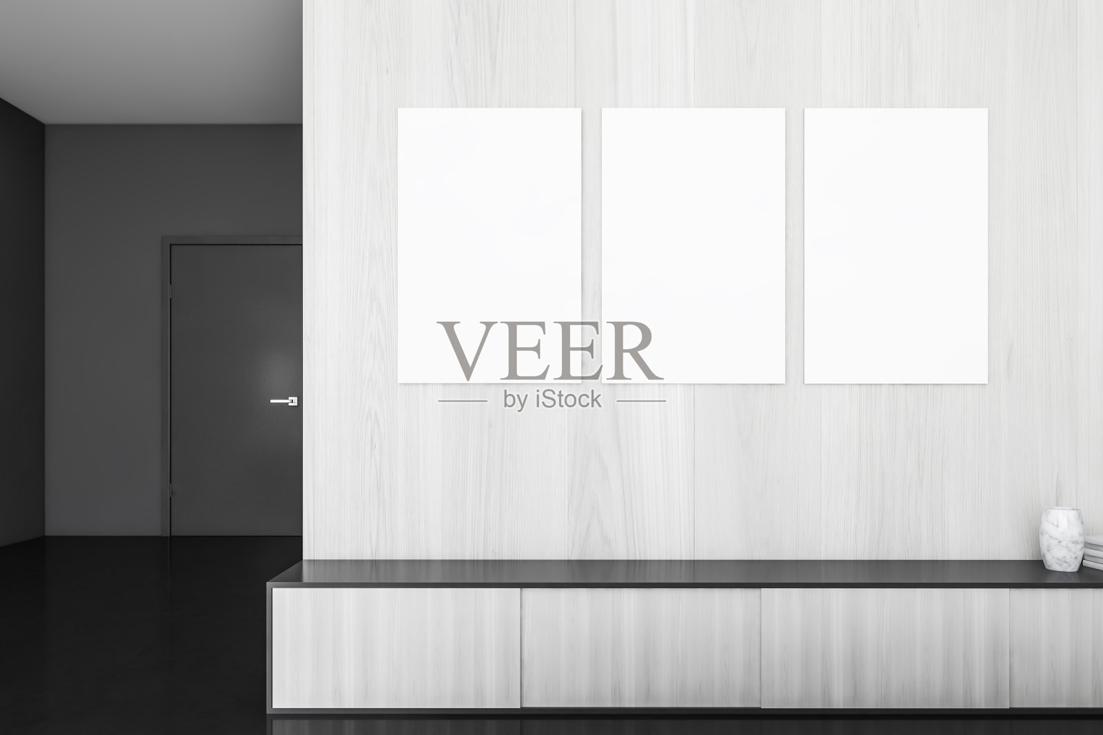 现代的室内。在黑色和浅色木制房间的抽屉上的模型框架照片摄影图片