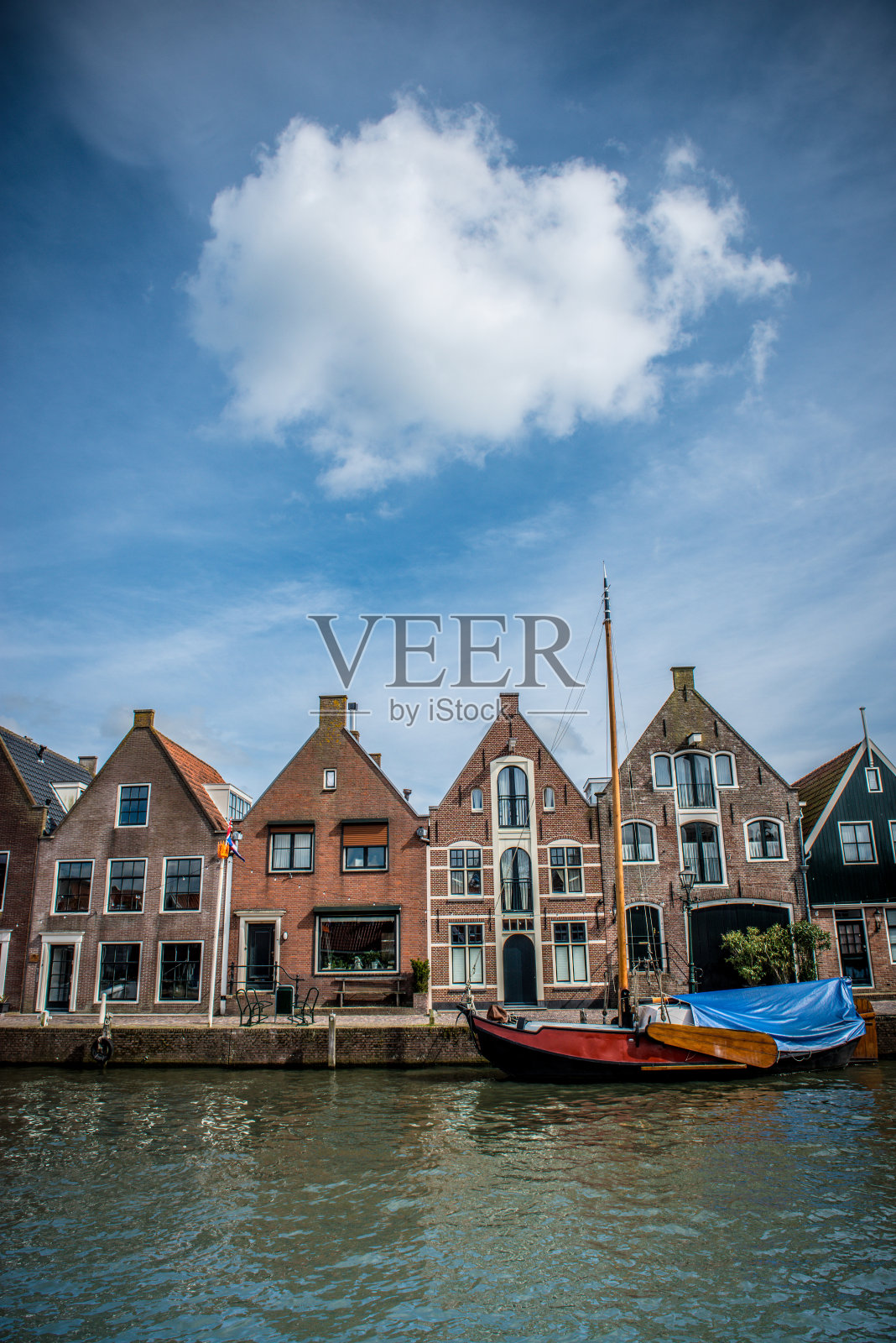 荷兰的乡村房屋和划艇照片摄影图片