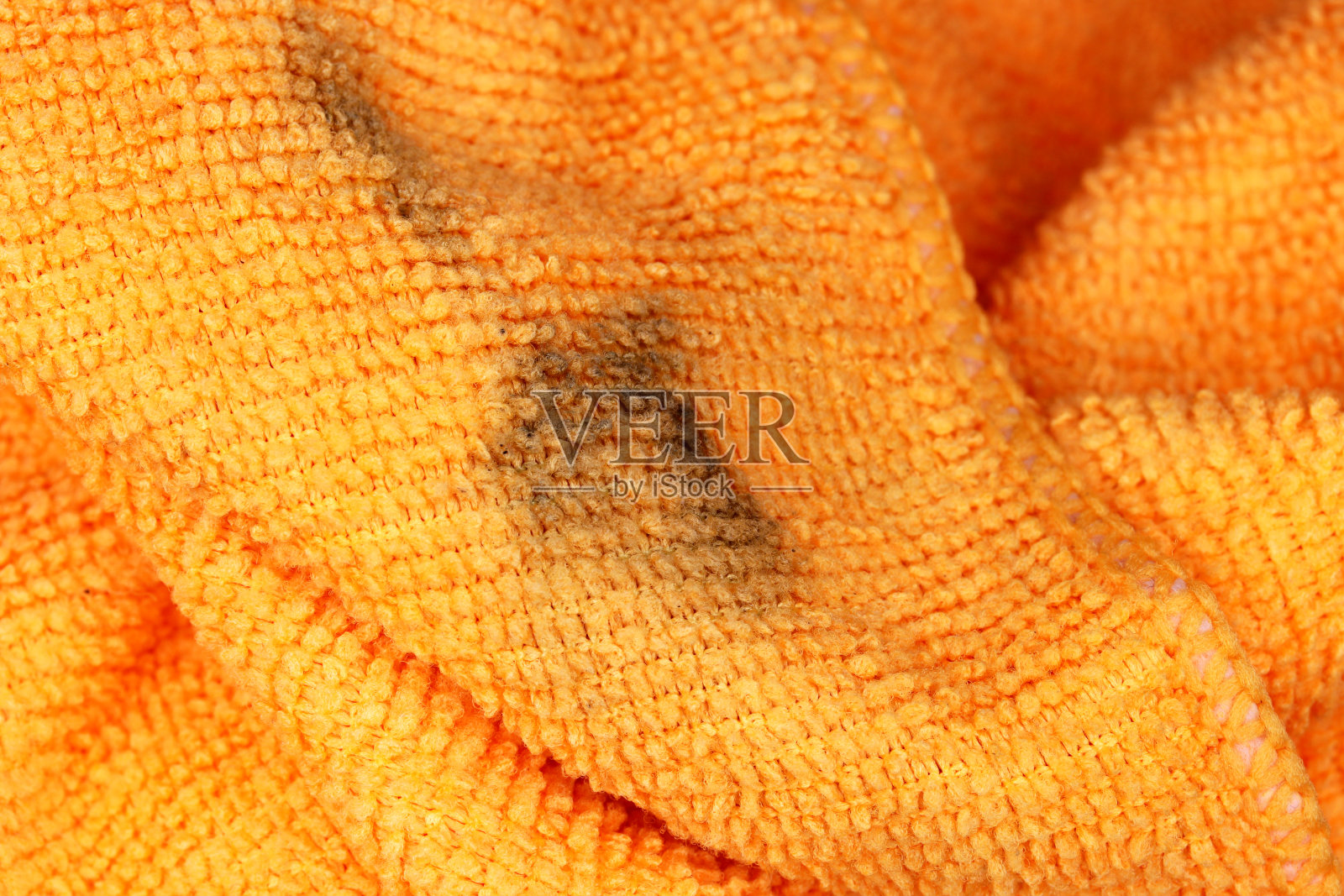 特写肮脏的橙色毛巾纹理细节照片摄影图片