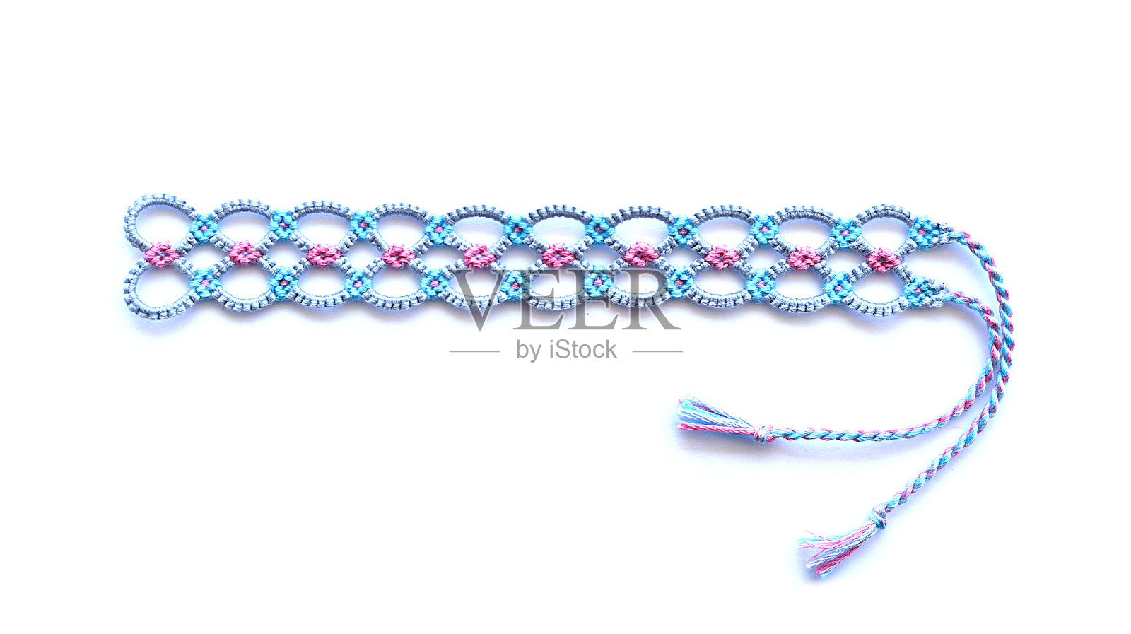 DIY友谊手链，独特的编织图案，白色背景照片摄影图片