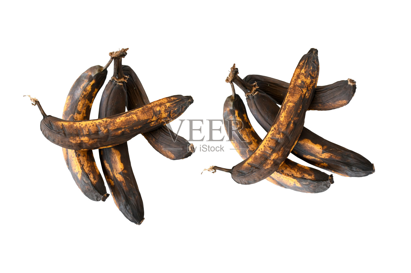 腐烂的香蕉，黑皮，深棕色和黄色，不新鲜。不健康和过期的水果。照片摄影图片