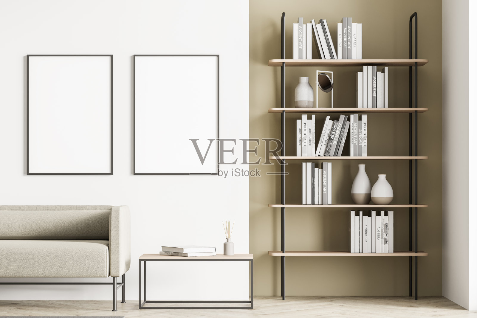 浅褐色沙发，茶几，书架和两张空白海报装饰的浅色现代客厅室内。镶花地板。家图书馆的概念。照片摄影图片