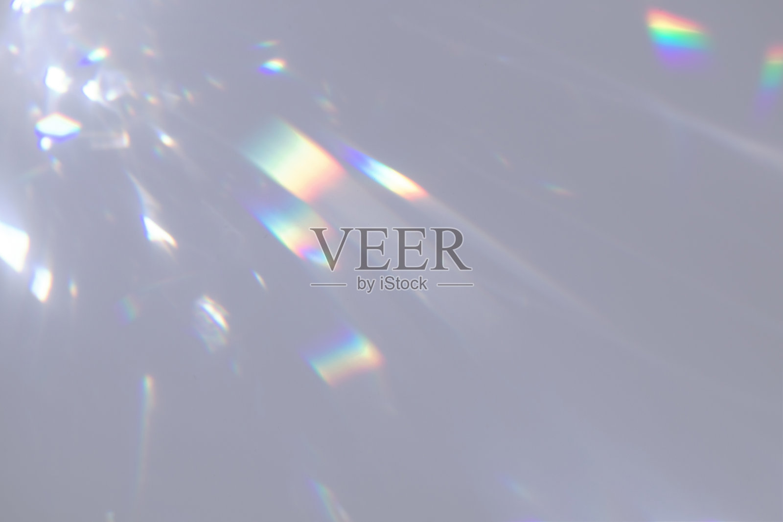 模糊的彩虹光折射纹理的白色墙壁照片摄影图片