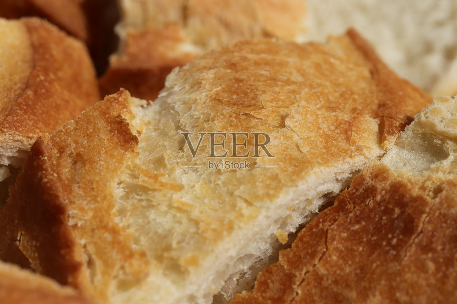 表面酥脆，呈接力棒状纹理。健康食品的背景。照片摄影图片