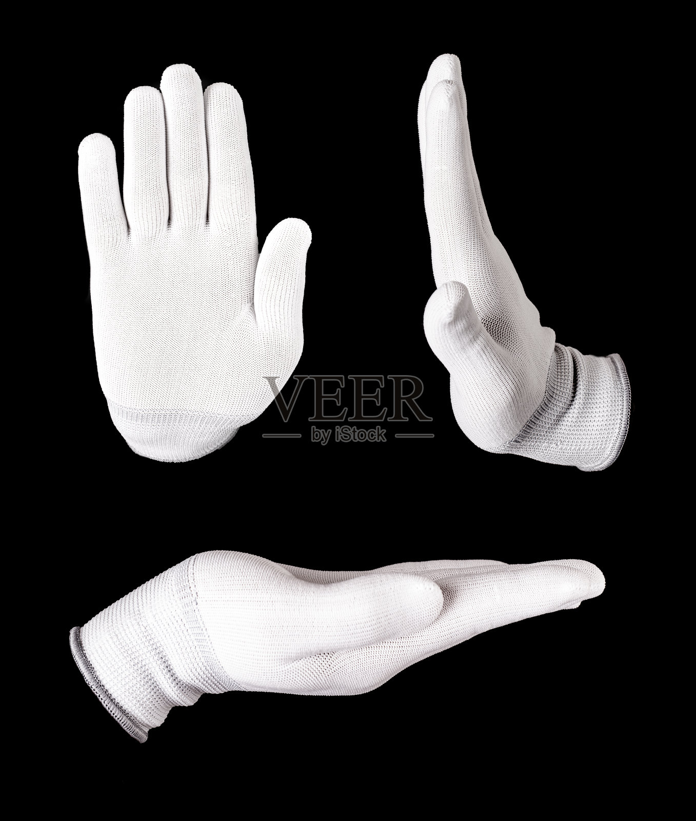 在黑色的背景下戴着白手套牵手。照片摄影图片