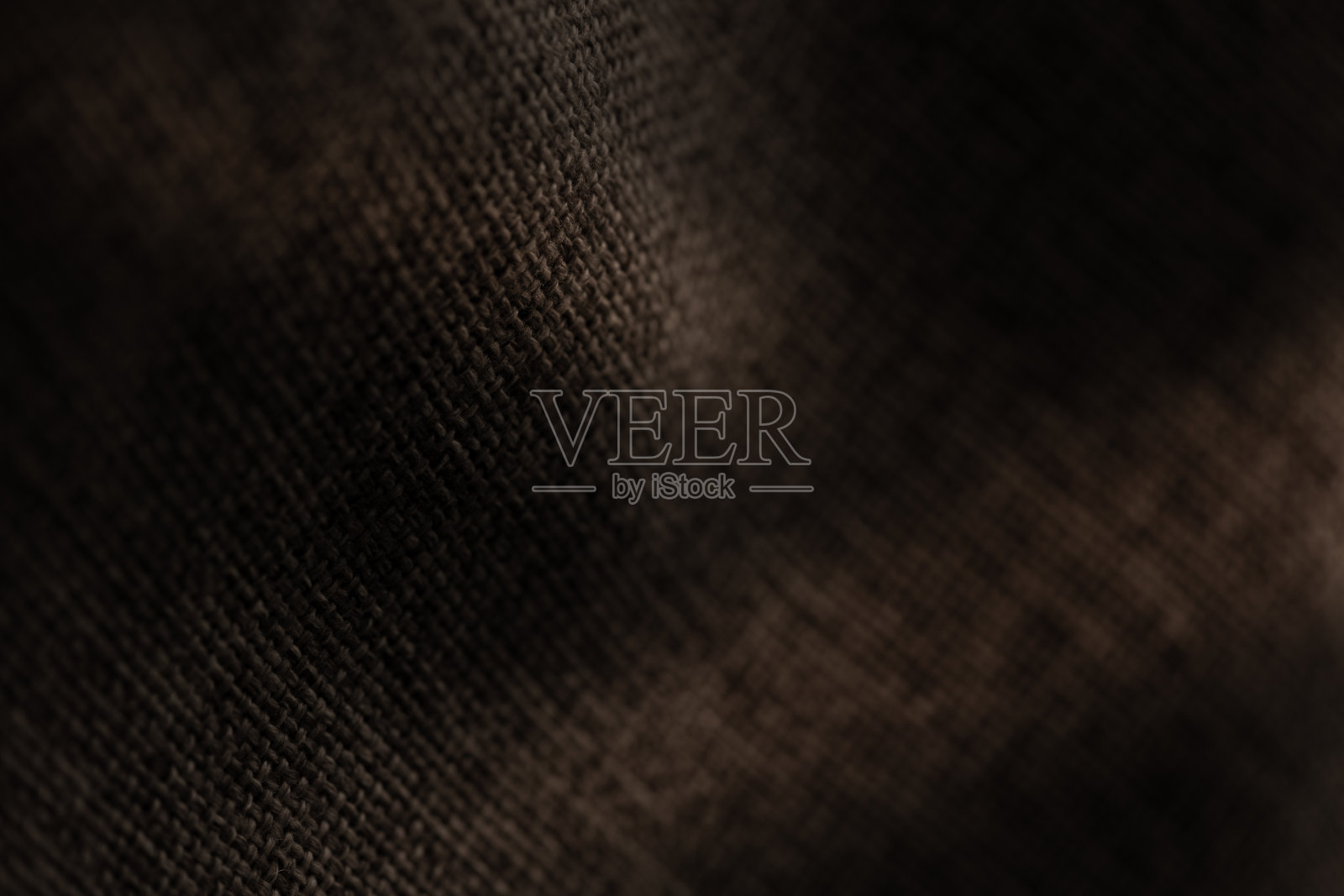 深色帆布或粗麻布质地与浅色照片摄影图片