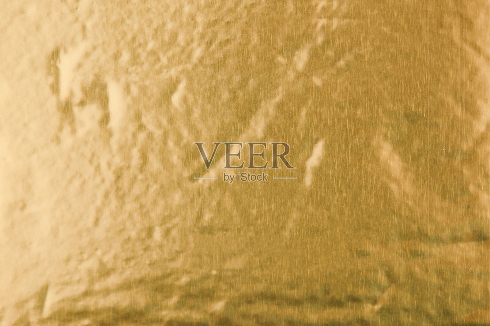 金色光泽的金属表面照片摄影图片