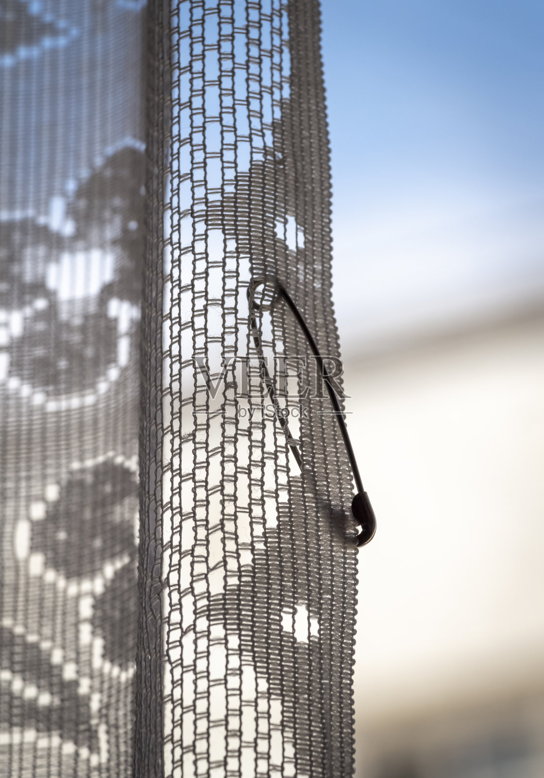 薄纱上的别针照片摄影图片