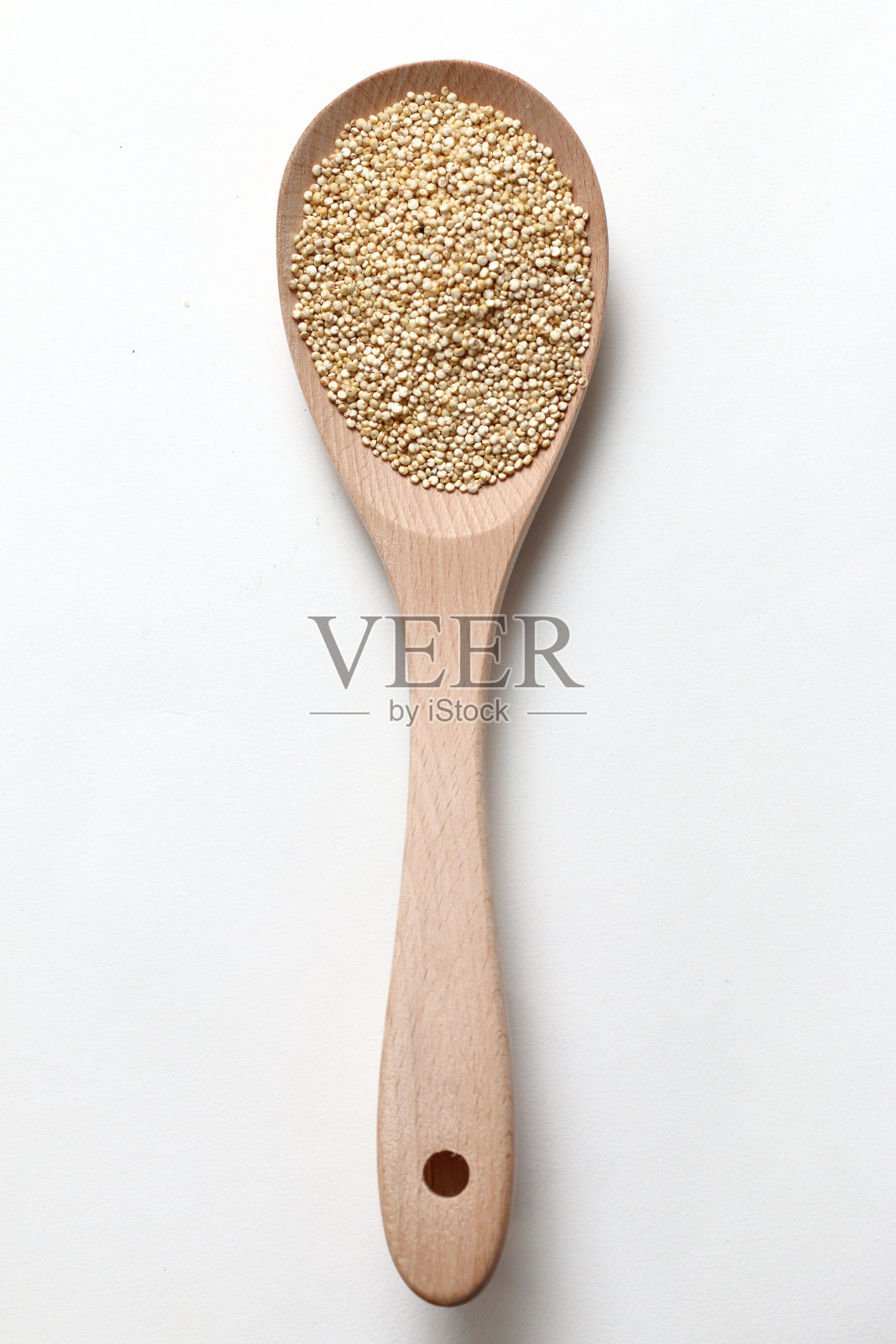 用勺子舀干的豆荚，对素食来说很健康照片摄影图片