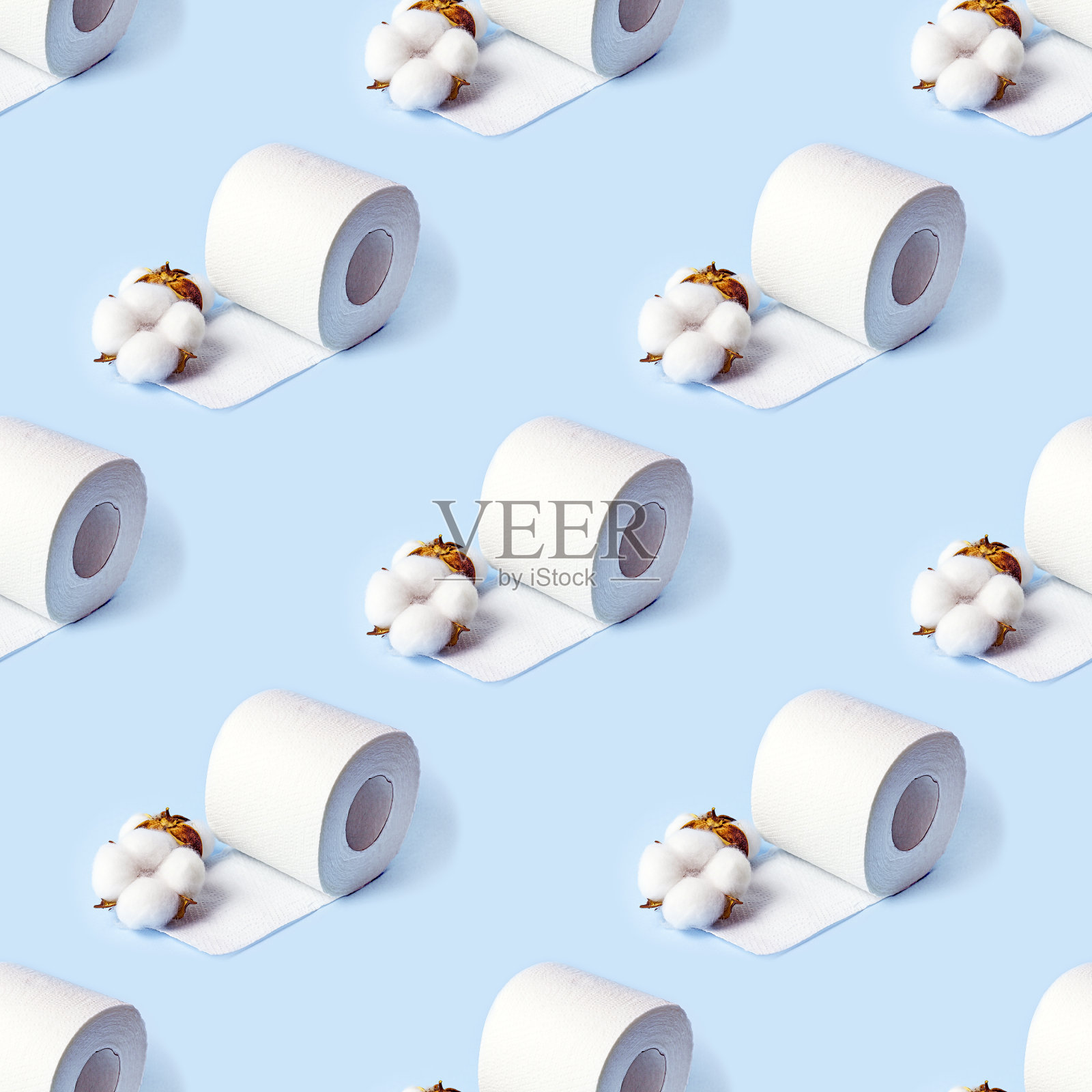 白色卫生纸卷在浅蓝色背景上重复无缝图案照片摄影图片