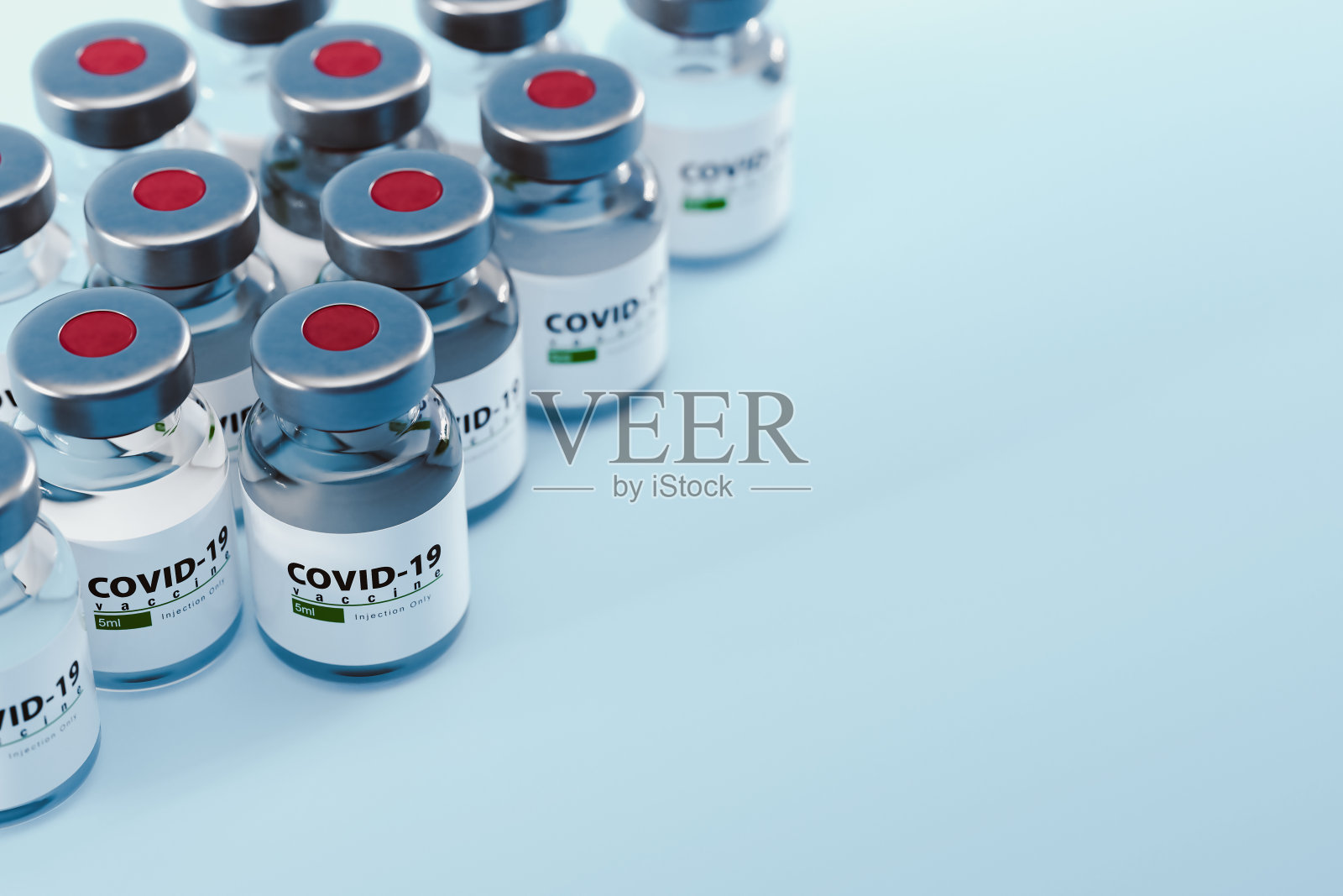 冠状病毒疫苗。sars-cov-2 COVID-19。部分新型冠状病毒疫苗安瓿。照片摄影图片