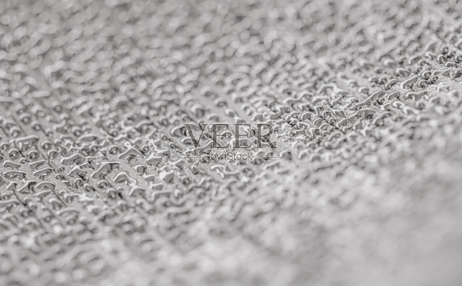 银色抽象模糊散焦背景。照片摄影图片