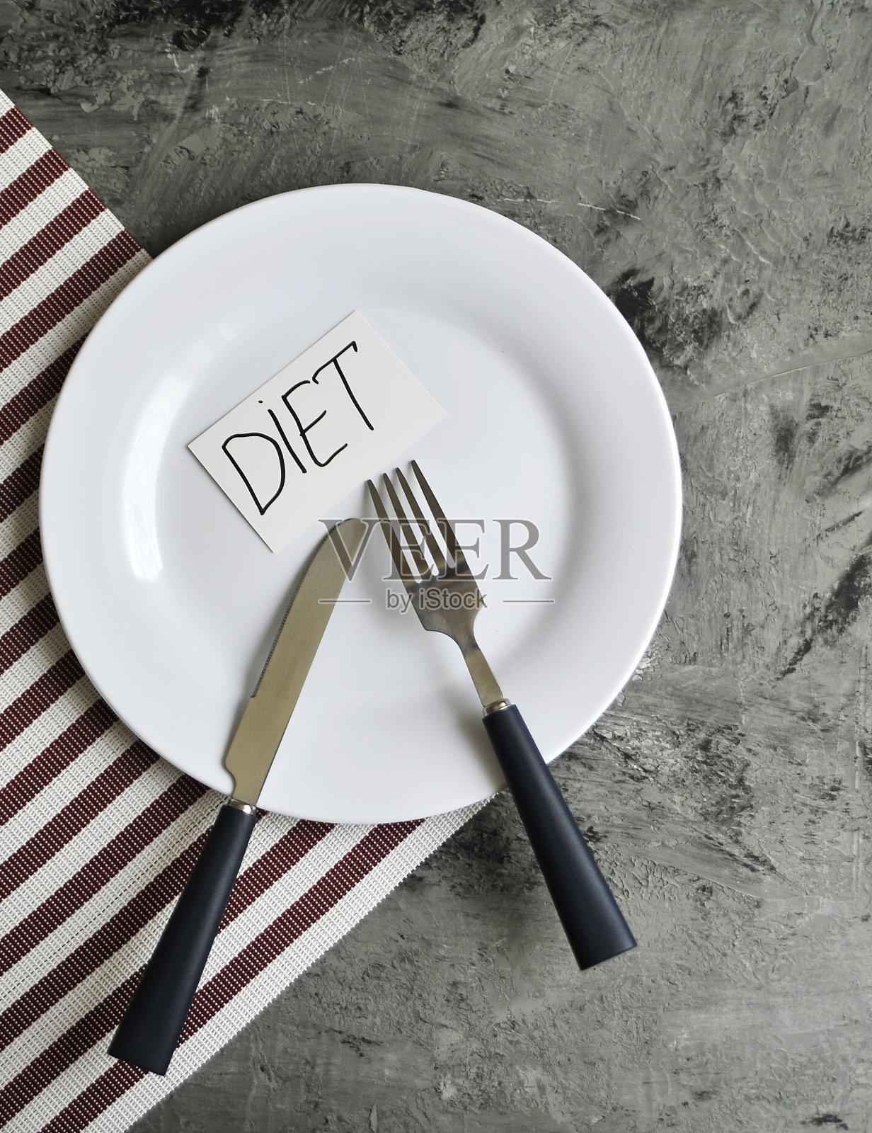 概念形象的饮食主题。装食物的盘子。照片摄影图片