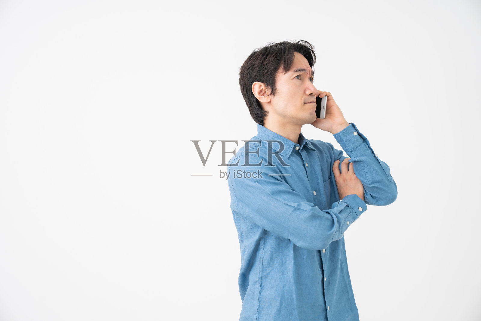 打电话的中年人，心里想，照片摄影图片