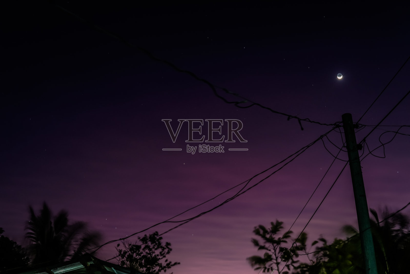 夕阳下的新月照片摄影图片