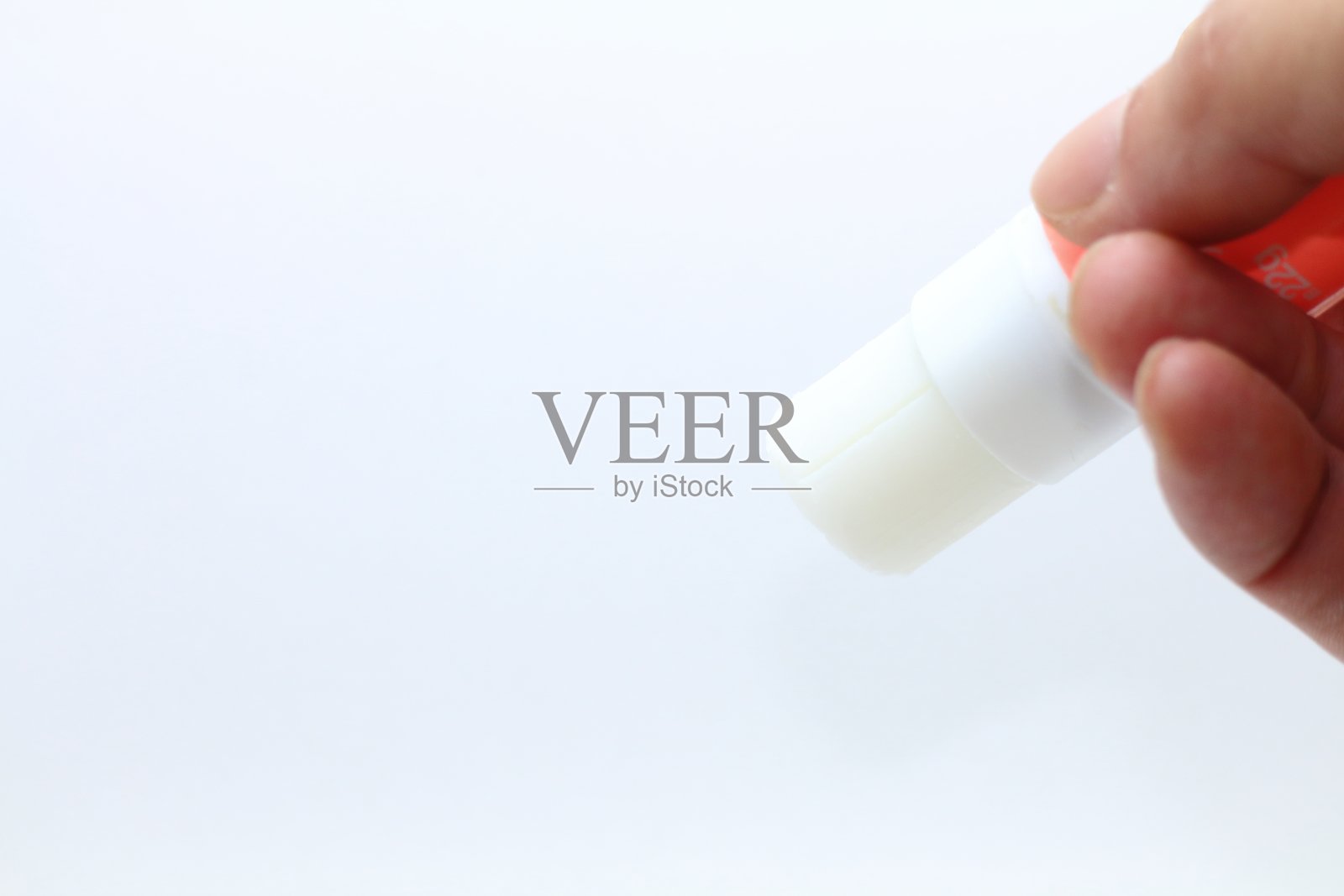 图像材料的胶水握在手中照片摄影图片