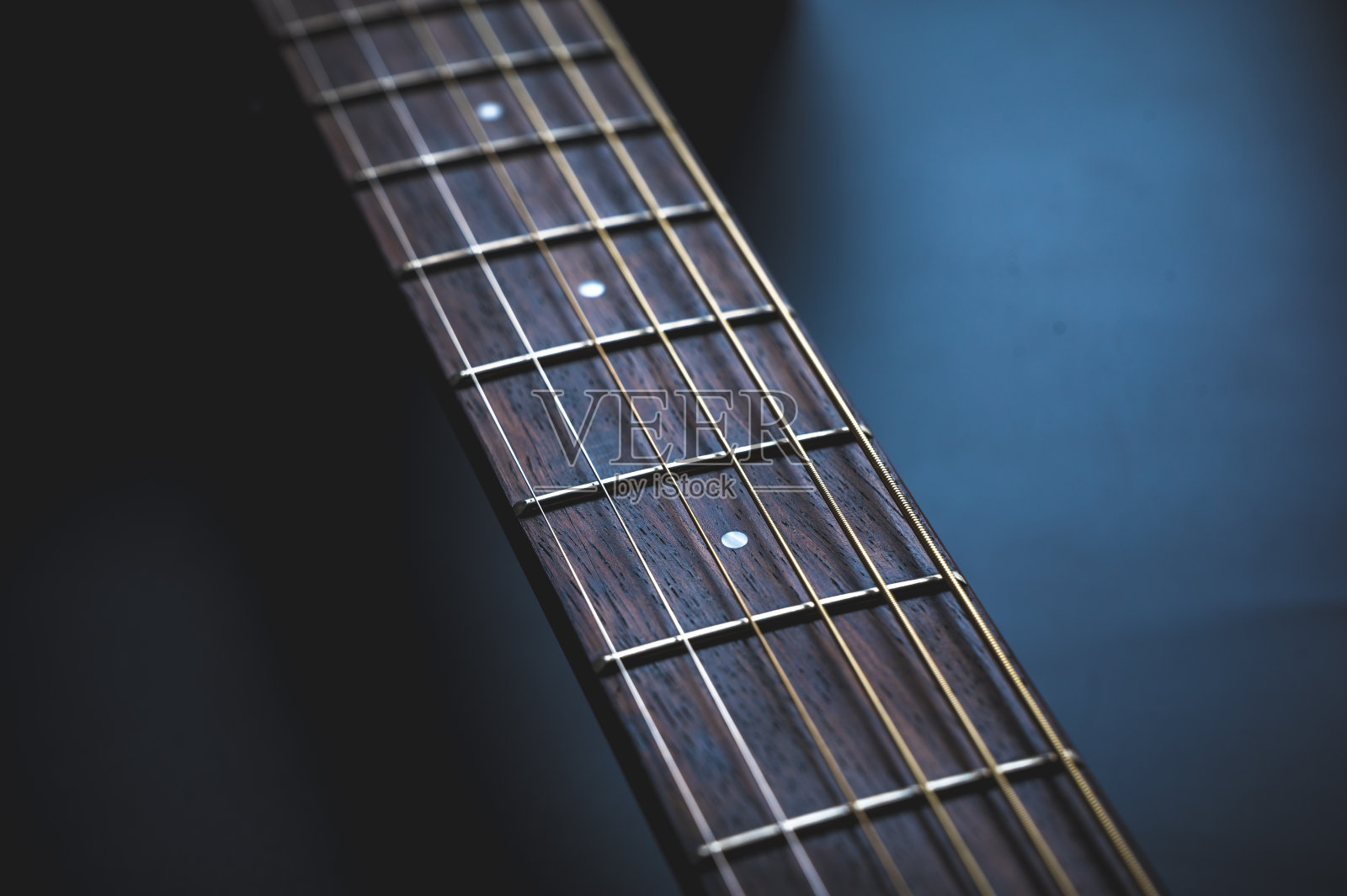 传统木质民间吉他，音乐艺术原声乐器，古典民间吉他的一部分照片摄影图片