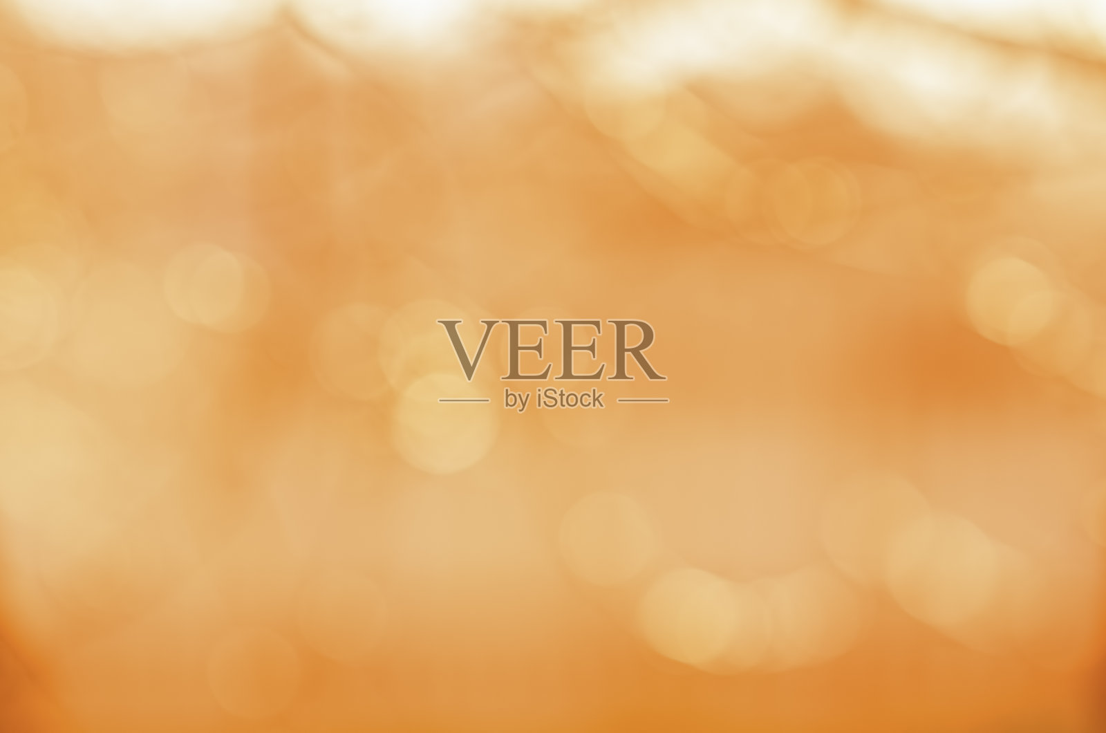 温暖的橙色背景与散景照片摄影图片