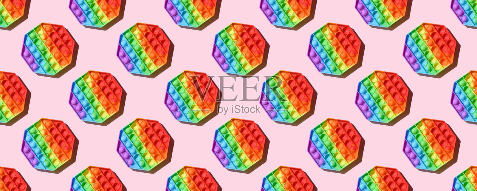 无缝硅胶图案彩色抗应力弹它玩具。照片摄影图片