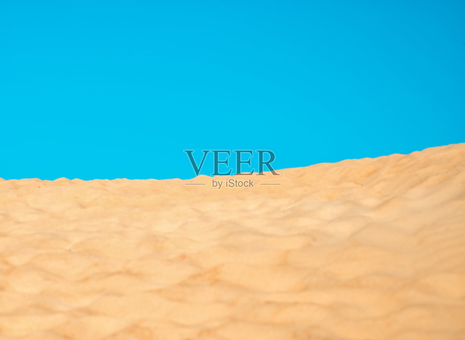 沙丘和蓝天。自然背景照片摄影图片